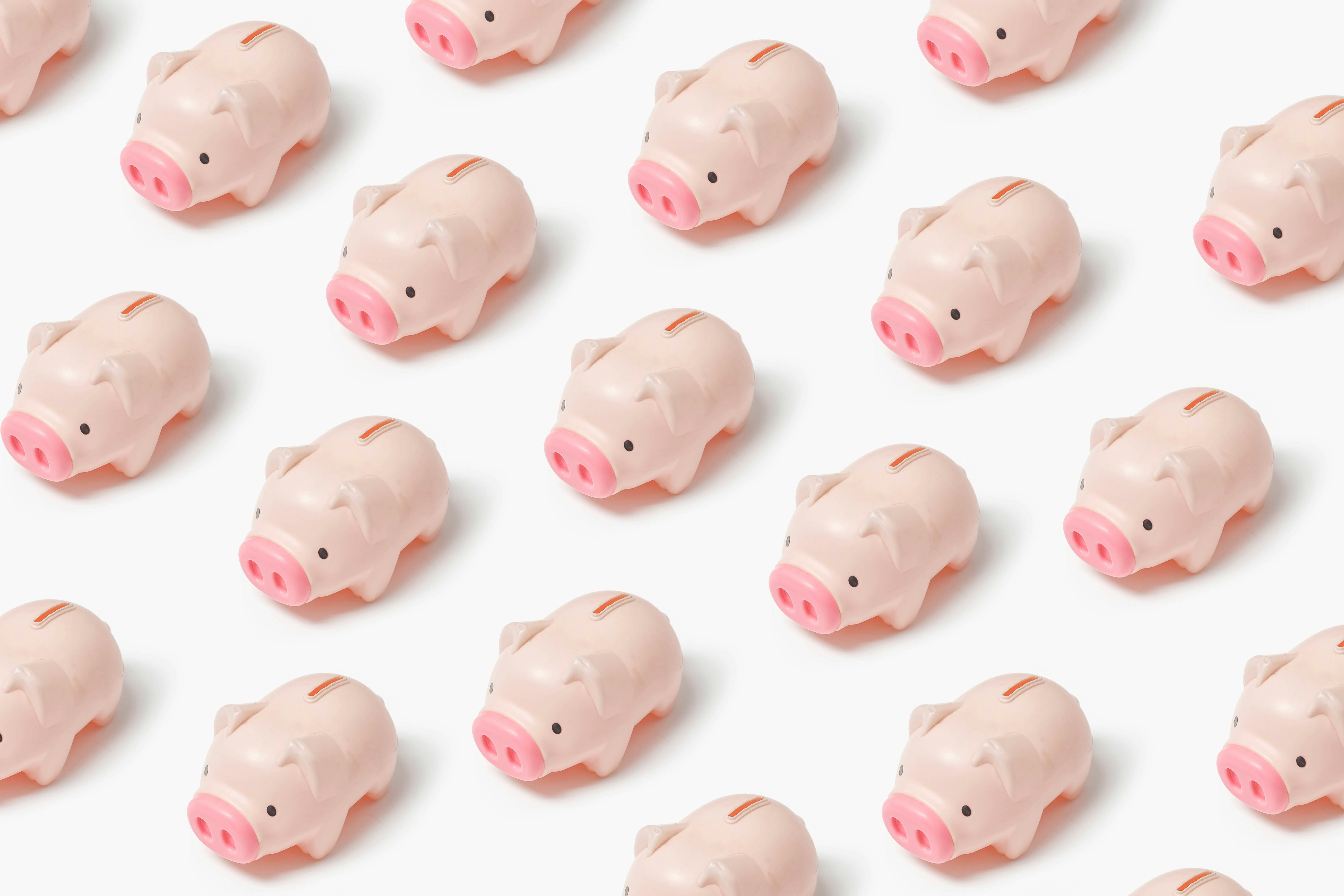 Multiple pink piggy banks illustrating Gigabits VPN's cost-saving pricing model